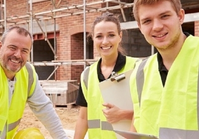 Drie medewerkers in de bouw